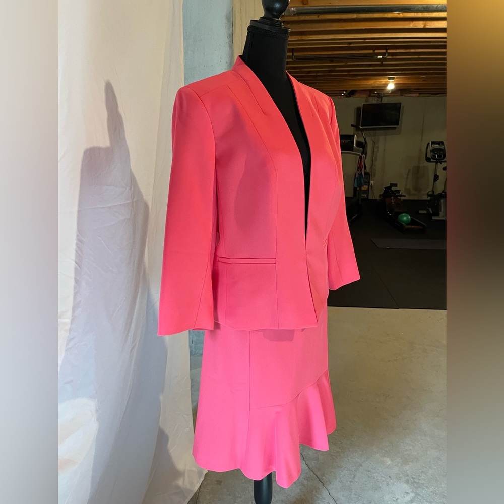 Brand new pink salmon color skirt suit.